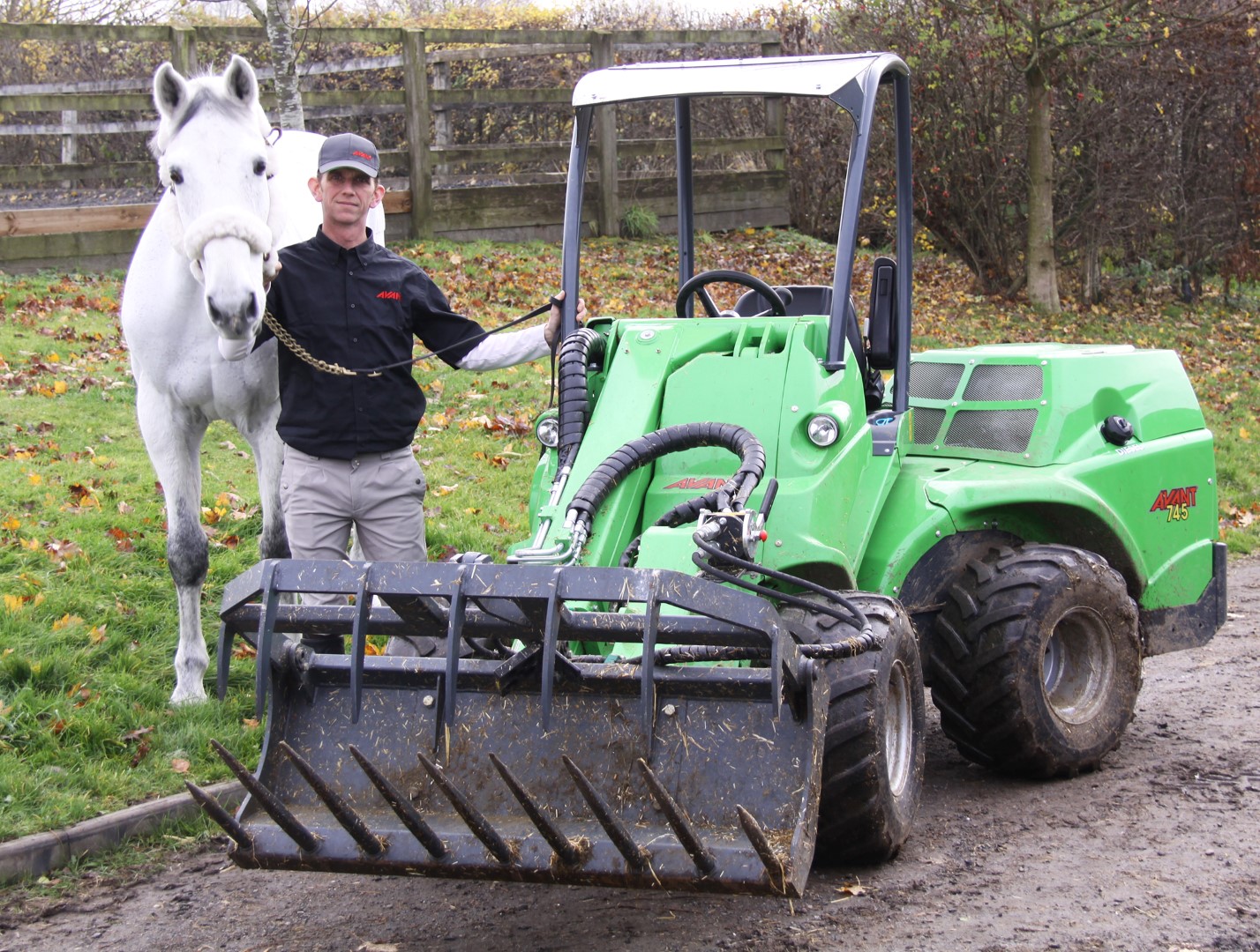 Phillip and Caritiar Z with the Avant compact tool carrier..jpg